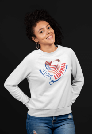 A woman wearing a white sweatshirt with the words " i love liberia ".