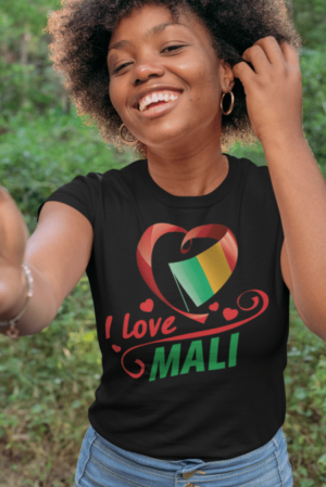 A woman in black shirt with green and red heart.