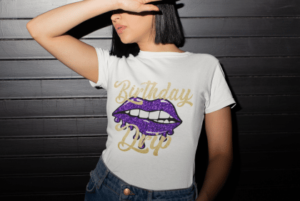 A woman wearing a white t-shirt with purple lips.