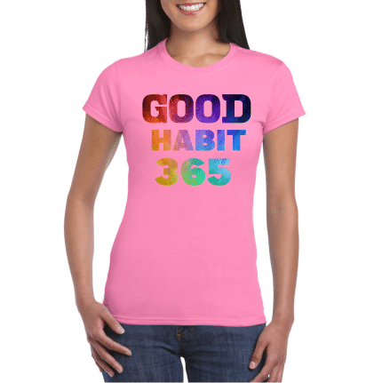 A woman wearing pink t-shirt with the words " good habit 3 6 5 ".