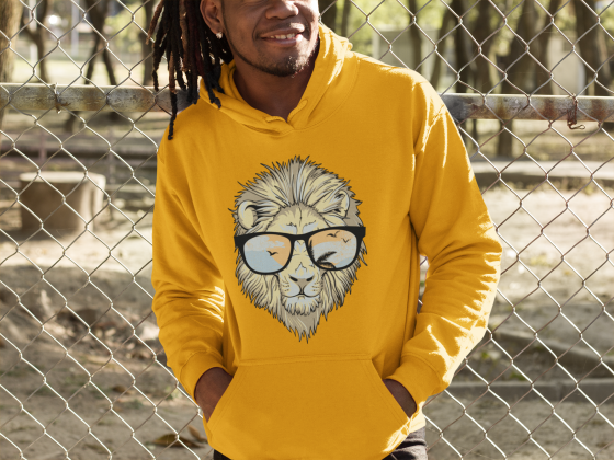 A man with dreadlocks wearing glasses and a lion hoodie.