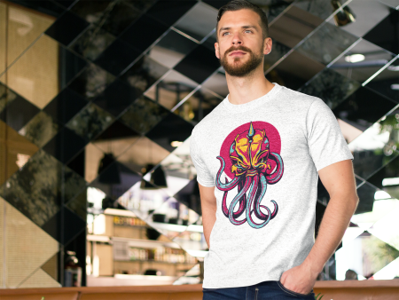 A man standing in front of a mirror wearing an octopus t-shirt.