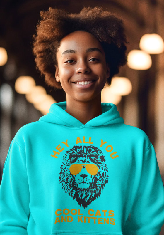 A woman wearing a blue hoodie with an image of a lion.